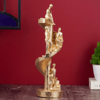 Gold Figures on Spiral Staircase Sculpture - The Golden Theory