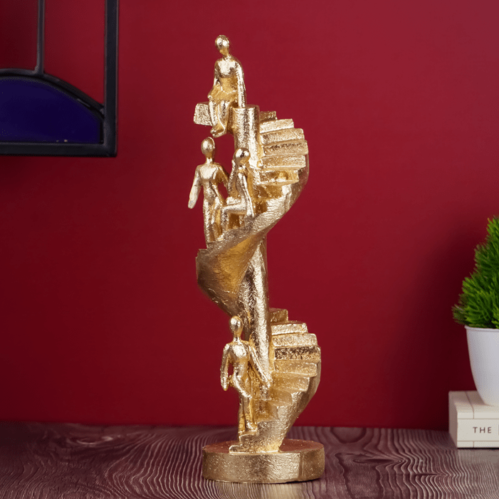 Gold Figures on Spiral Staircase Sculpture - The Golden Theory
