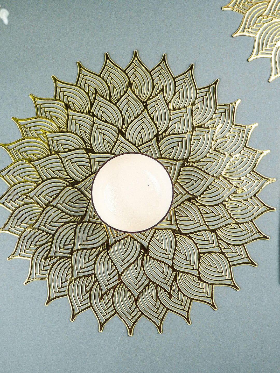 Gold Floral Cutout Table Mat with Intricate Petal Design - The Golden Theory