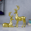 Gold Reindeer Statues - The Golden Theory