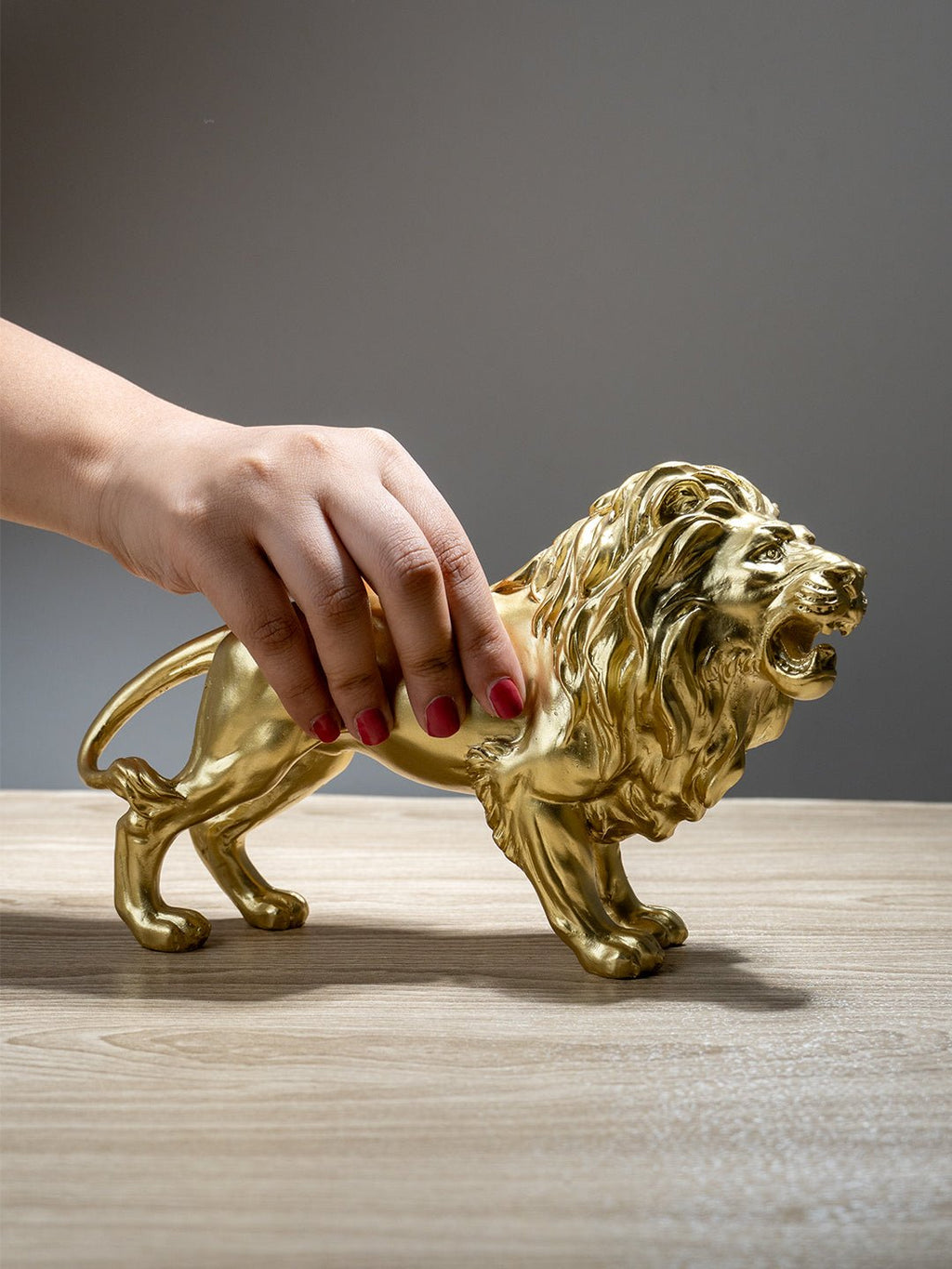 Golden Lion Figurine with Intricate Mane - The Golden Theory