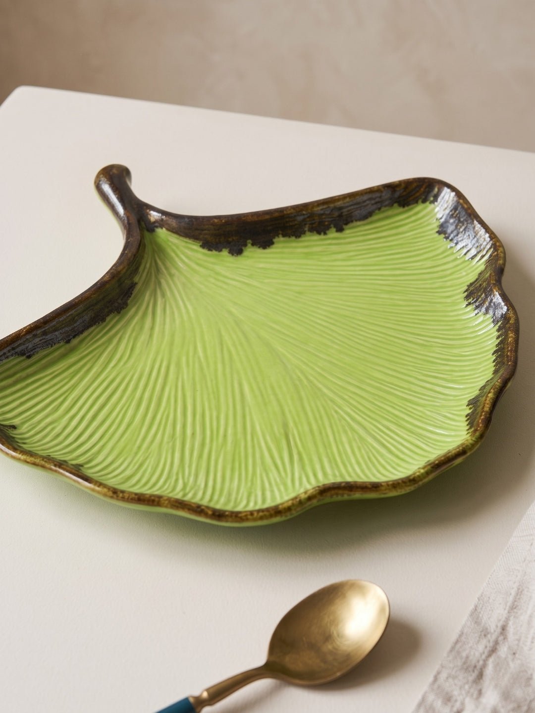 Green Ceramic Shell Shaped Platter with Brown Borders - The Golden Theory