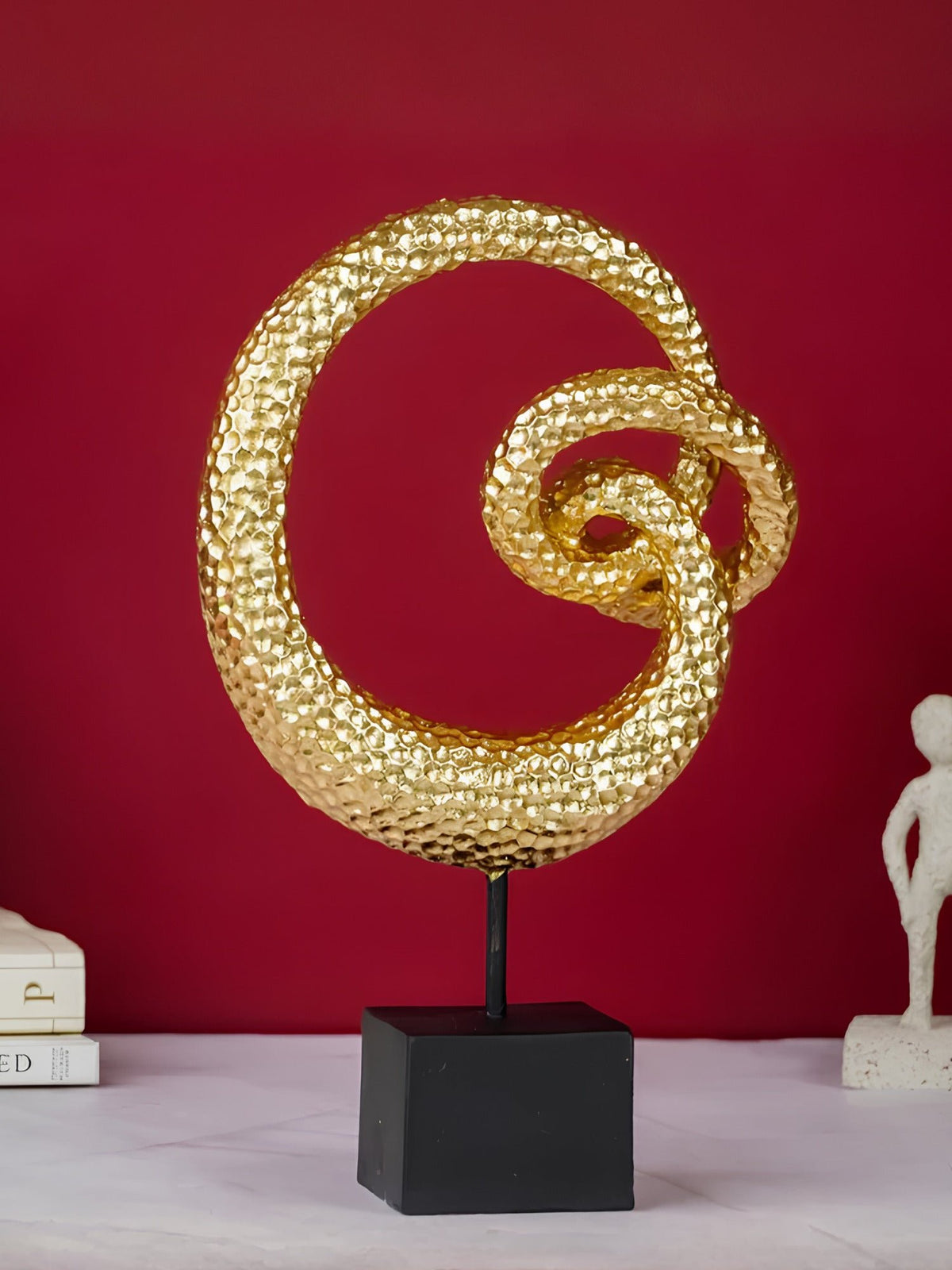 Knot Statue on Black Base - The Golden Theory Main image