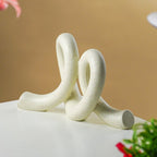 Marble Finish White Intertwined Loop Sculpture - The Golden Theory