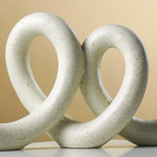 Marble Finish White Intertwined Loop Sculpture - The Golden Theory