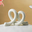Marble Finish White Intertwined Loop Sculpture - The Golden Theory