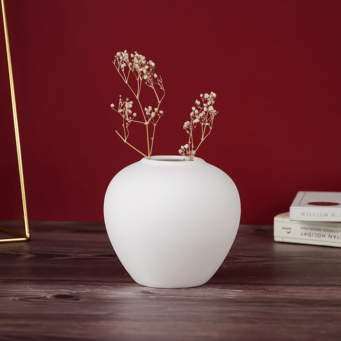 Matte White Ceramic Vase with Smooth Curved Design - The Golden Theory Main image