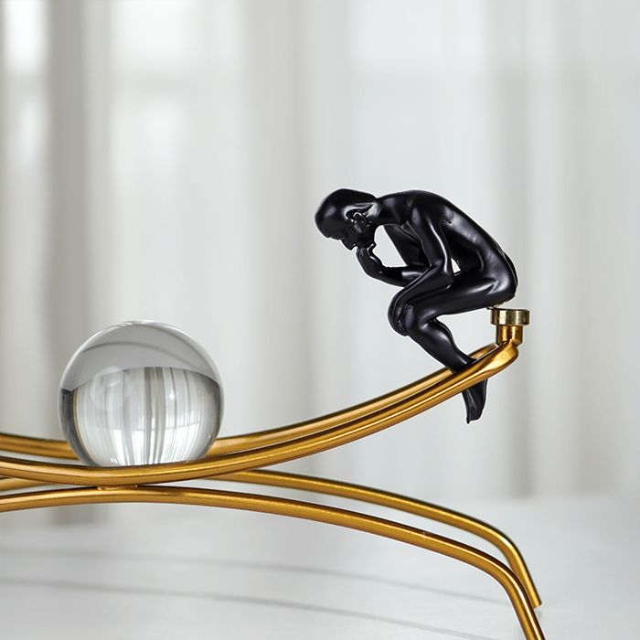 Modern Black Thinker Sculptures on Gold Arch with Crystal Sphere - The Golden Theory