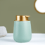Modern Green Soap Dispenser with Gold Top - The Golden Theory
