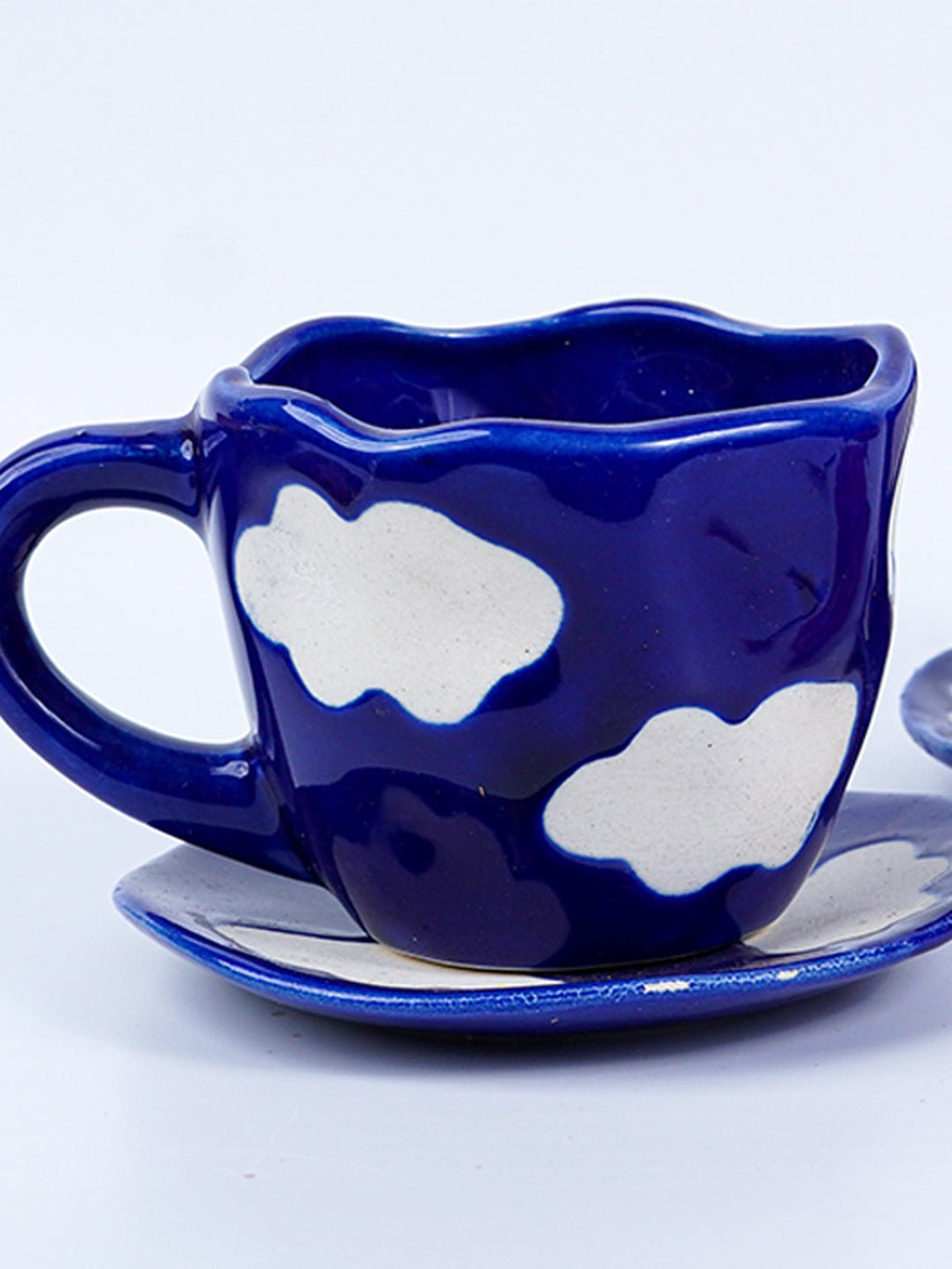 Navy Blue Cloud-Patterned Ceramic Cup and Saucer Set - The Golden Theory