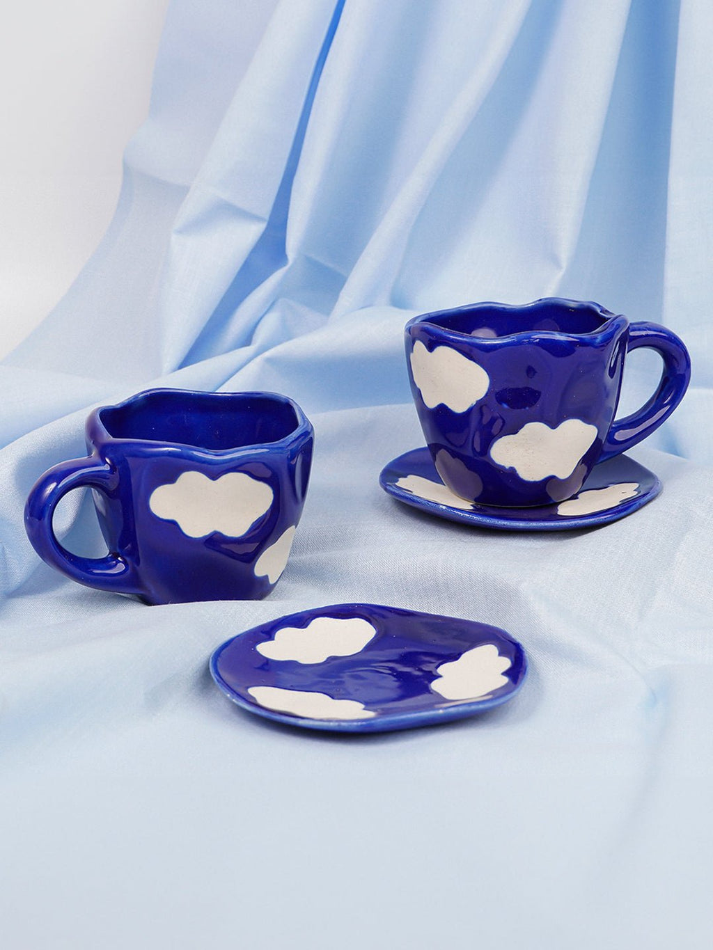 Navy Blue Cloud-Patterned Ceramic Cup and Saucer Set - The Golden Theory