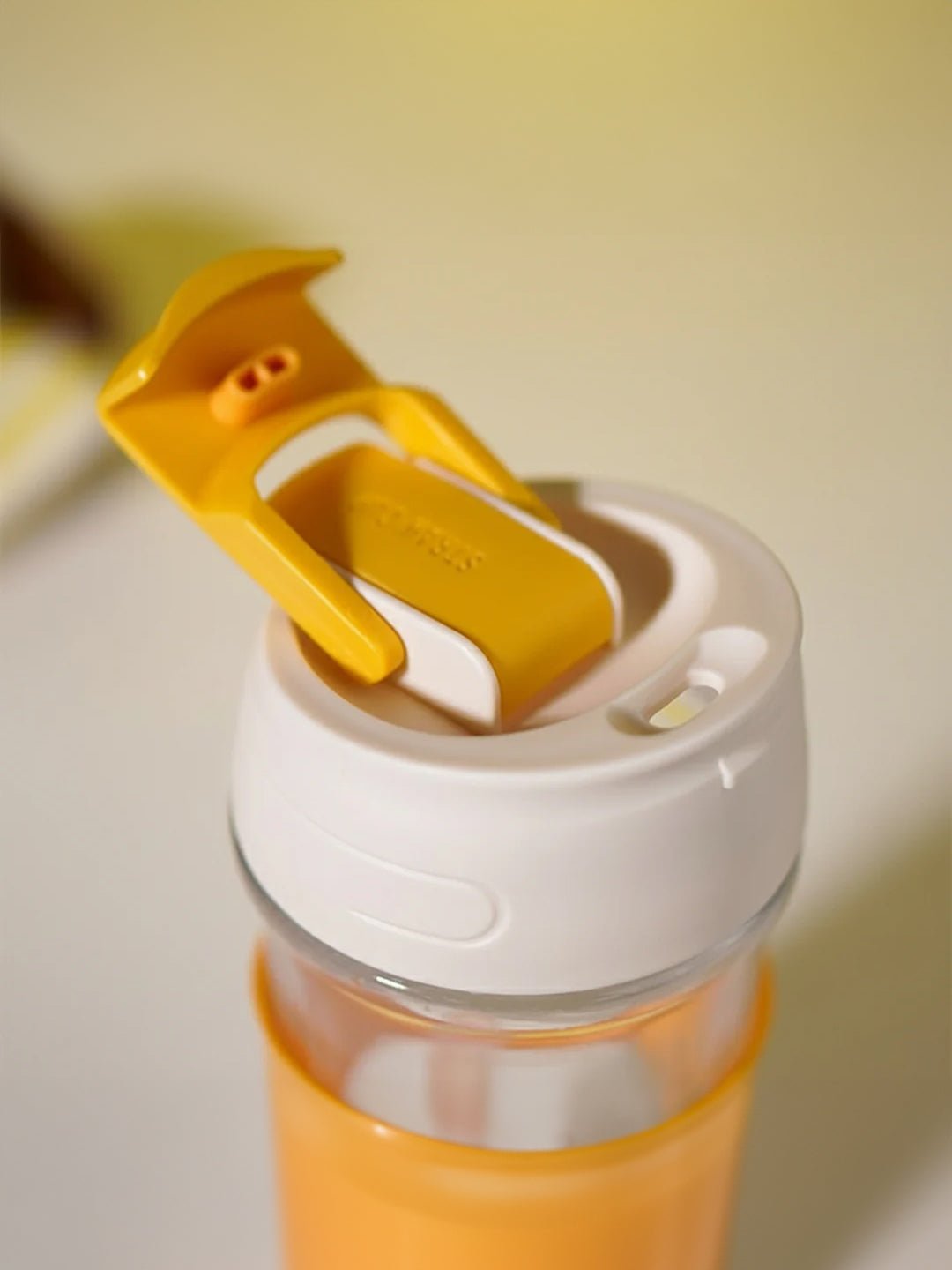 Orange Grip Glass Sipper with Built-In Straw - The Golden Theory