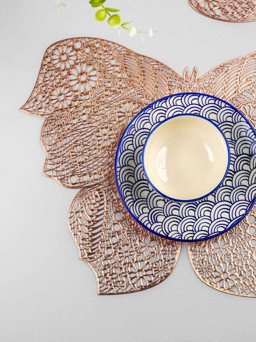 Rose Gold Butterfly Cutout Table Mat with Intricate Floral Design - The Golden Theory