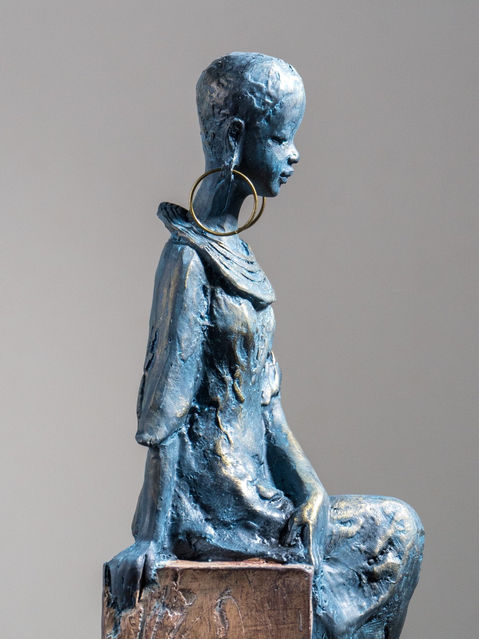 Seated Woman Sculpture on Wood Textured Pedestal – Forward-Facing Figure Statue Secondary image