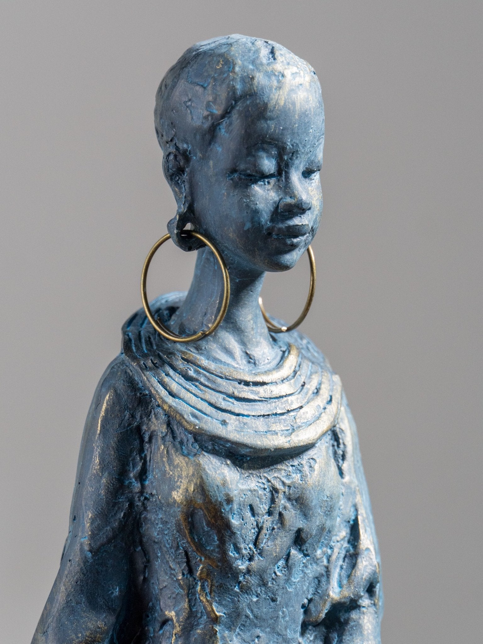 Seated Woman Sculpture on Wood Textured Pedestal – Forward-Facing Figure Statue - The Golden Theory