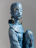 Seated Woman Sculpture on Wood Textured Pedestal – Profile Pose Figure Statue - The Golden Theory