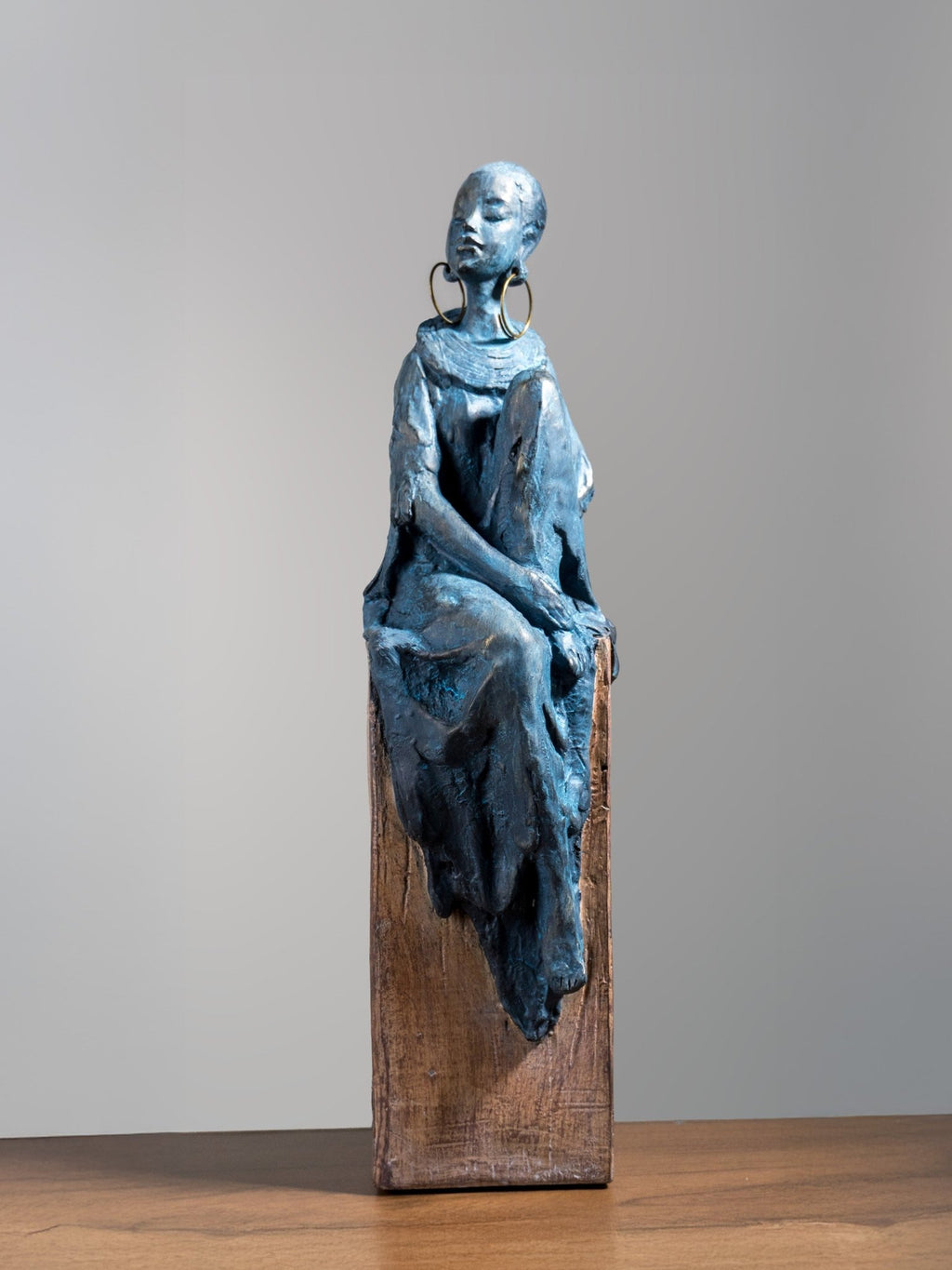 Seated Woman Sculpture on Wood Textured Pedestal – Profile Pose Figure Statue - The Golden Theory