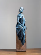 Seated Woman Sculpture on Wood Textured Pedestal – Profile Pose Figure Statue - The Golden Theory