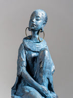 Seated Woman Sculpture on Wood Textured Pedestal – Profile Pose Figure Statue - The Golden Theory