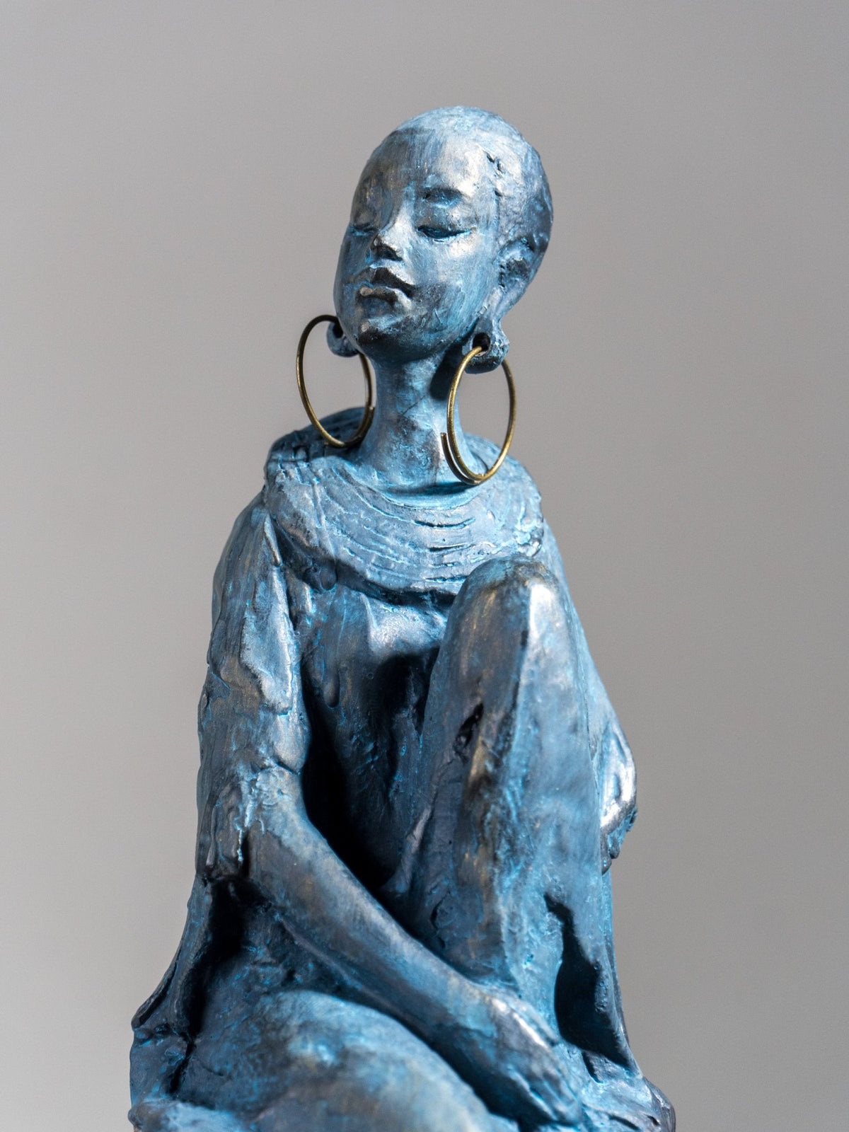 Seated Woman Sculpture on Wood Textured Pedestal – Profile Pose Figure Statue - The Golden Theory