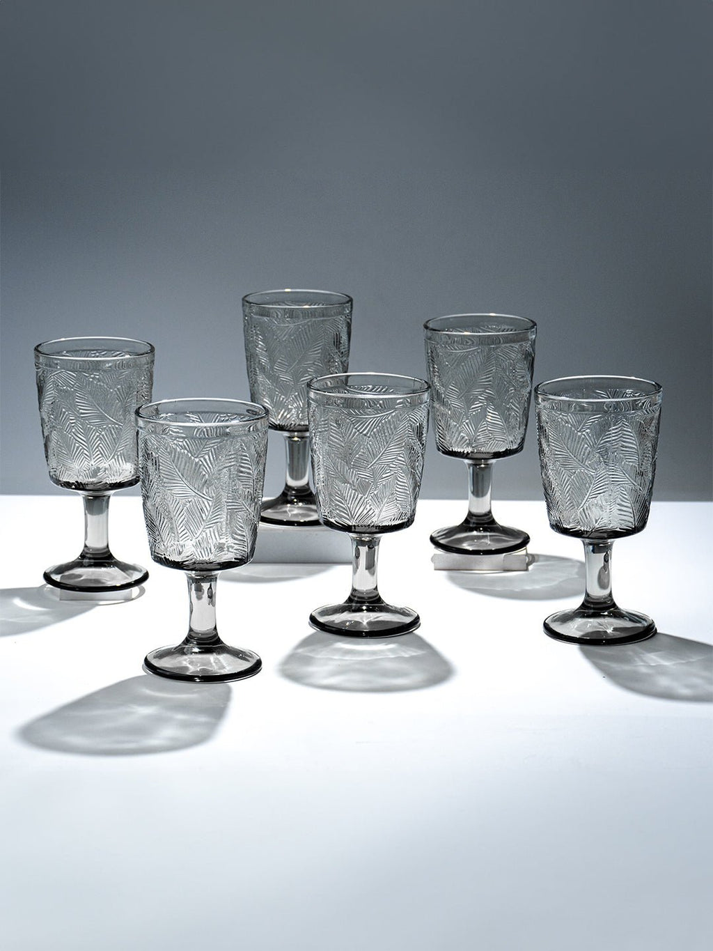 Smoky Black Palm Leaf Embossed Glass Goblet - The Golden Theory