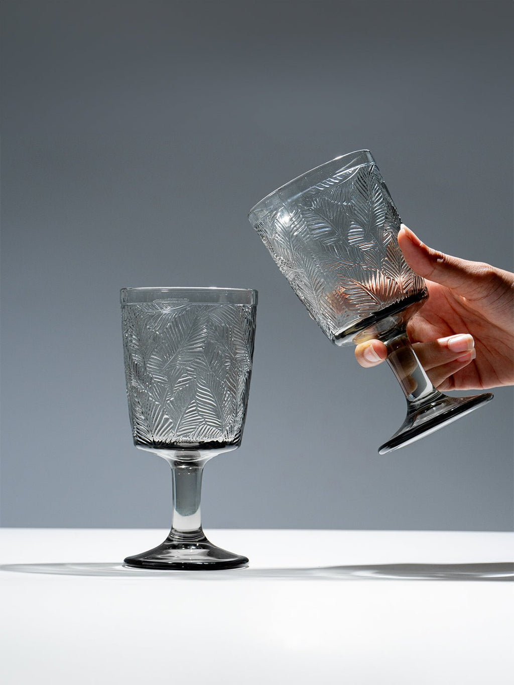 Smoky Black Palm Leaf Embossed Glass Goblet - The Golden Theory
