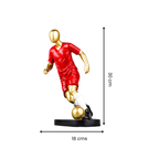 Soccer Player Sculpture in Red Uniform - The Golden Theory