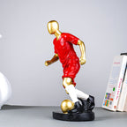 Soccer Player Sculpture in Red Uniform - The Golden Theory