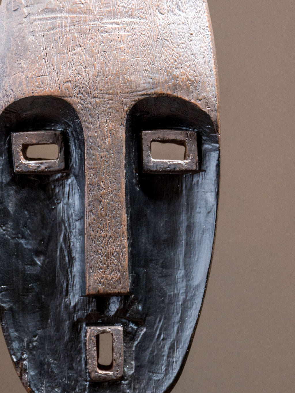 Tribal Wood-Look Mask Sculpture – Angular Face Statue - The Golden Theory