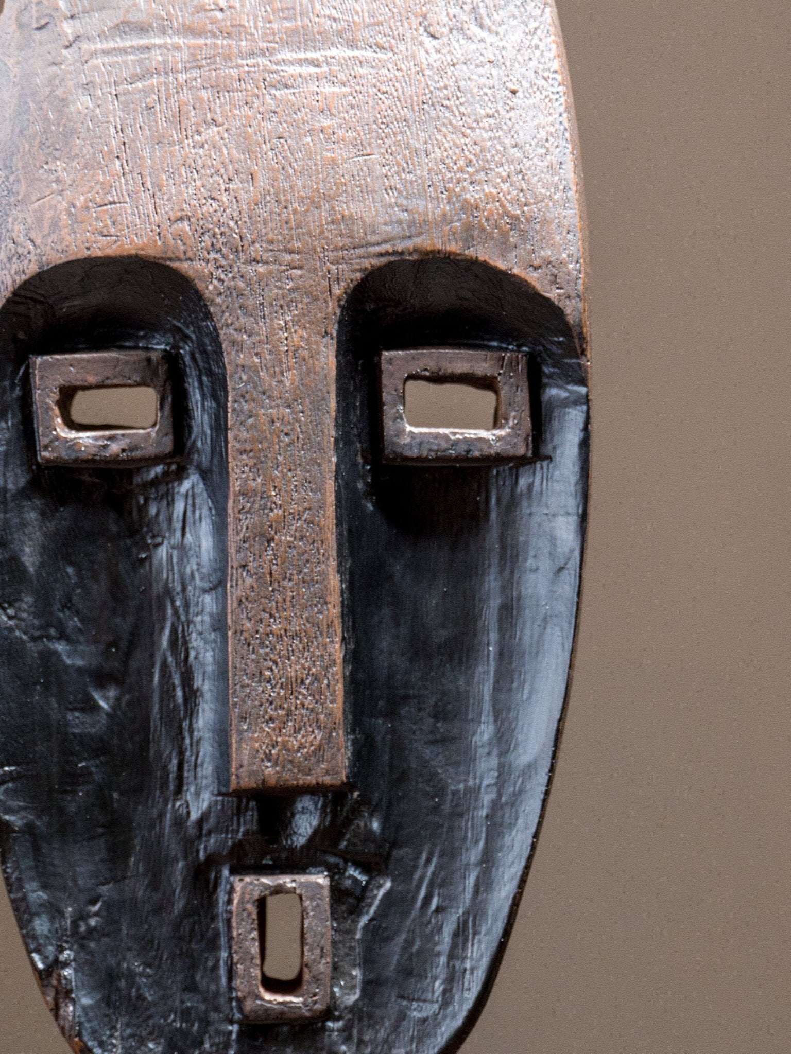 Tribal Wood-Look Mask Sculpture – Angular Face Statue - The Golden Theory