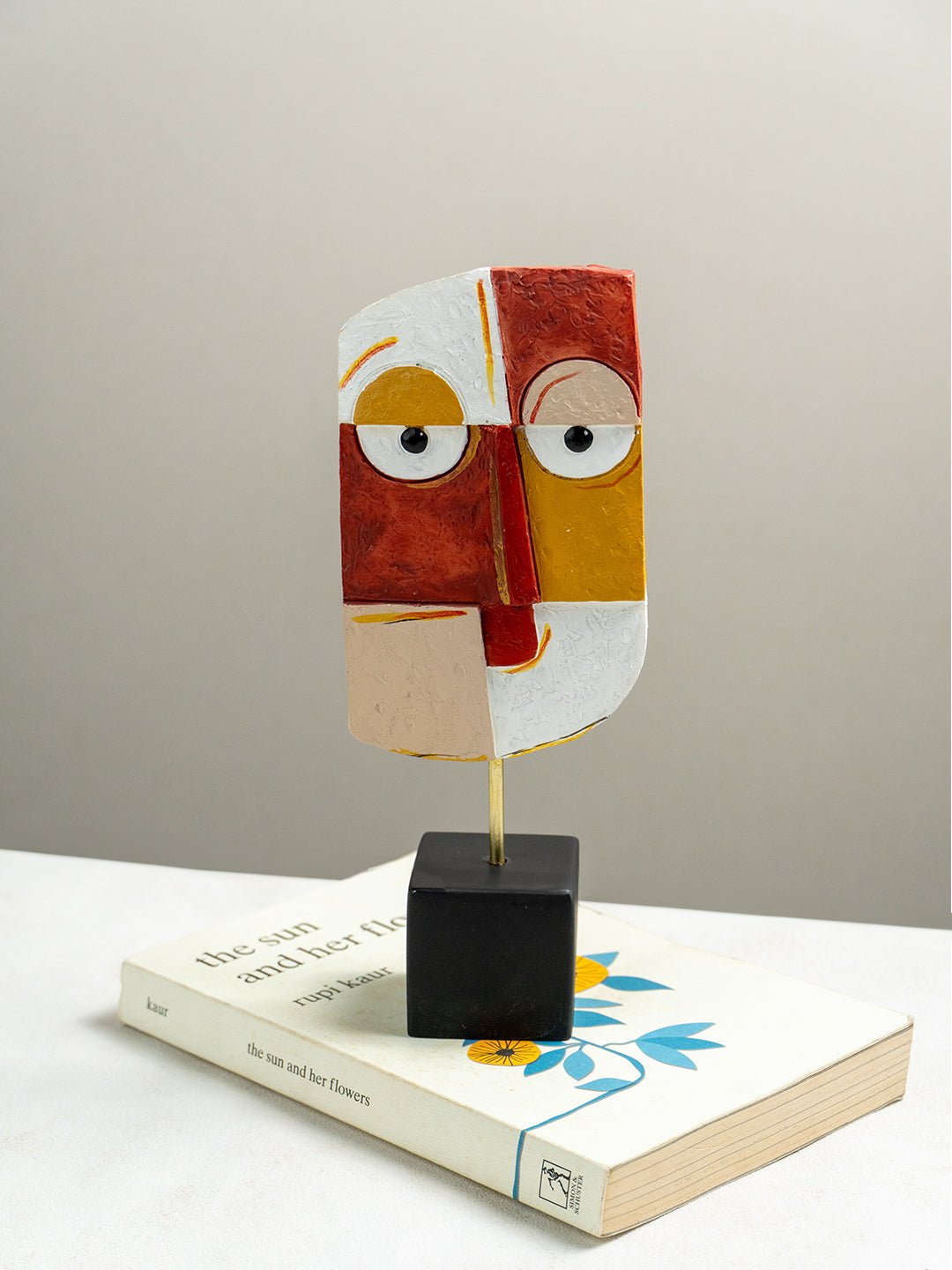 Vibrant Abstract Face Sculpture in Red, Yellow, and White Secondary image