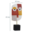 Vibrant Abstract Face Sculpture in Red, Yellow, and White - The Golden Theory