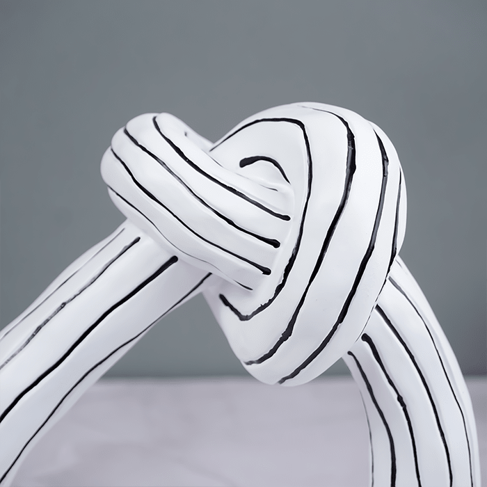 White and Black Striped Knot Sculpture - The Golden Theory