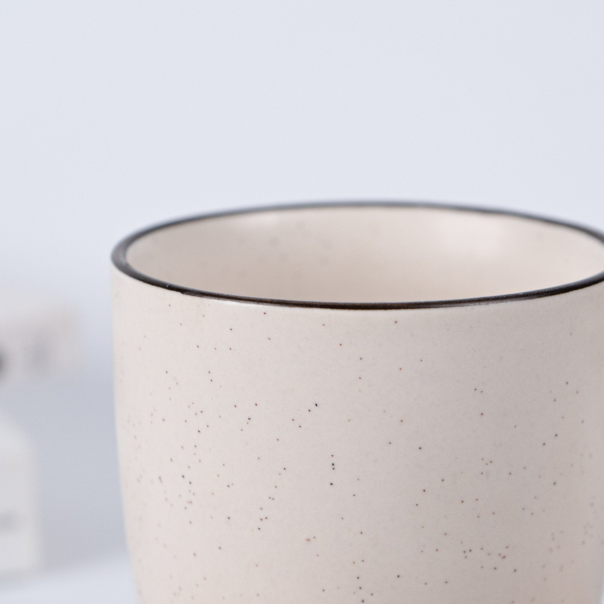 White Ceramic Coffee Mug with Black Border - The Golden Theory