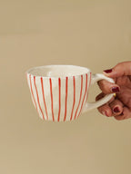 White Ceramic Cup with Hand-Painted Red Stripes - The Golden Theory