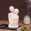 White Ceramic Embracing Couple - The Golden Theory