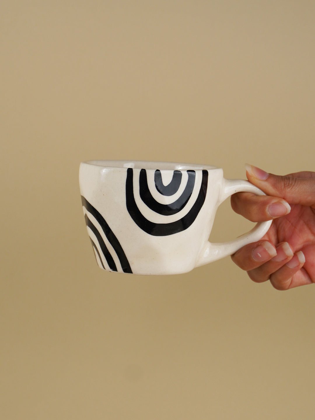 White Ceramic Mug with Hand-Painted Black Arch Design - The Golden Theory