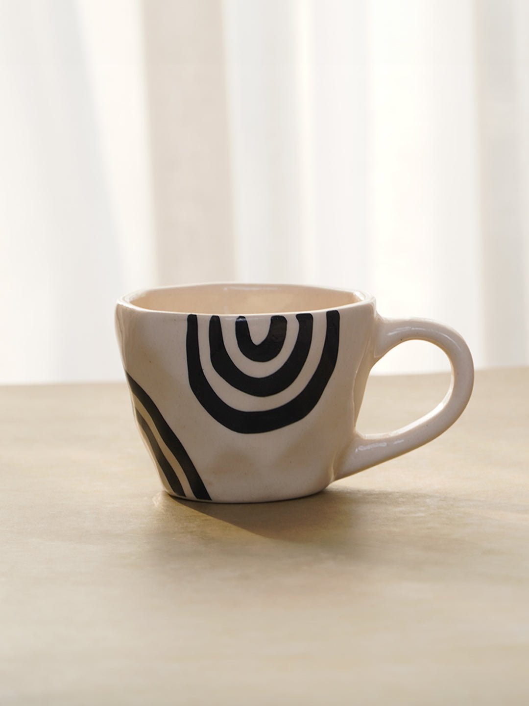 White Ceramic Mug with Hand-Painted Black Arch Design - The Golden Theory