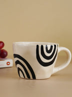 White Ceramic Mug with Hand-Painted Black Arch Design - The Golden Theory