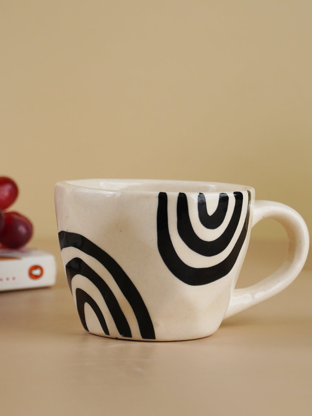 White Ceramic Mug with Hand-Painted Black Arch Design - The Golden Theory