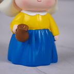 Yellow and Blue Dutch Girl Figurine with White Bonnet - The Golden Theory